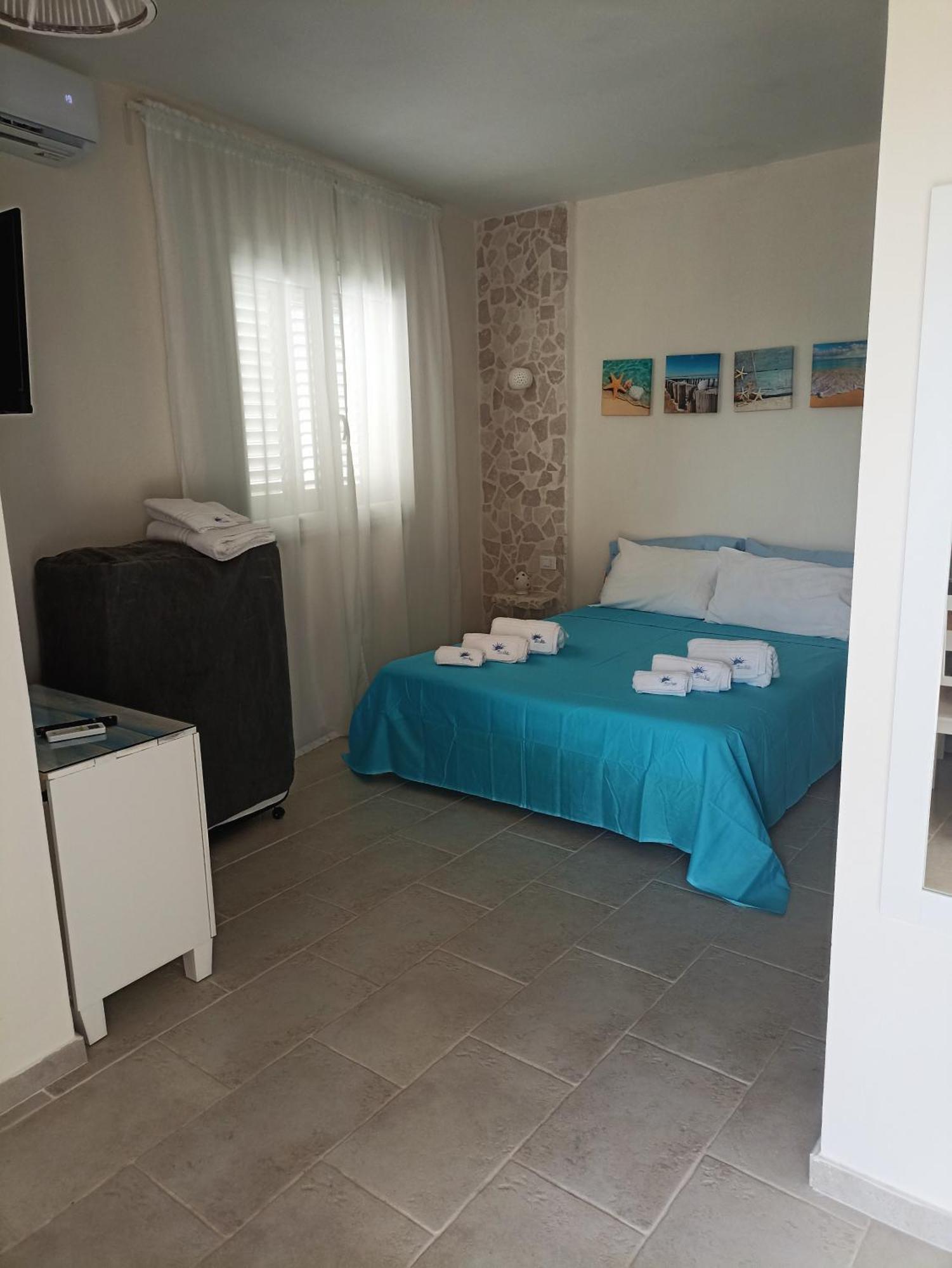 Bluesun Apartments Лепорано Экстерьер фото